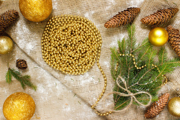 New Year's decorations on burlap and tree branches