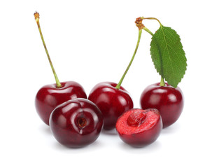 cherry with green leaf isolated on white background.