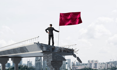 Man with flag presenting leadership concept.