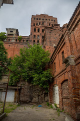 Old abandoned red brick grain elevator 