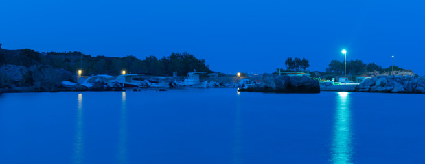 Pigaki port in Paros island in Greece during the blue hour.
