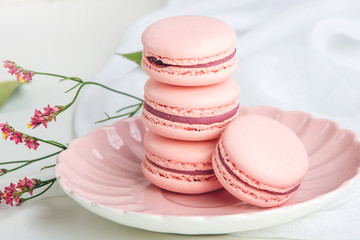 Pink strawberry macarons. French delicate dessert for Breakfast
