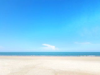 Fototapeta na wymiar Empty sea and beach on blue sky background