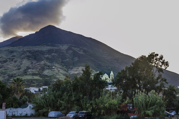 View of stromboli volcano and village from its own island