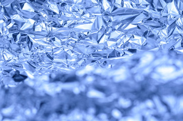abstract wrinkled aluminum foil background, crispy mountain look, shallow depth of field