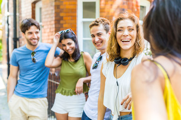 Group of friends talking and having fun