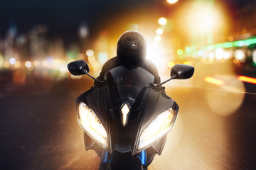 front of a motorcycle at night