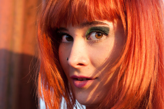 Red head sexy streaptease girl urban concrete destruct landscape