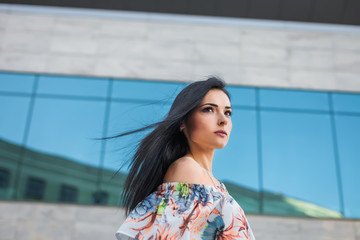 fashionable girl walking in city