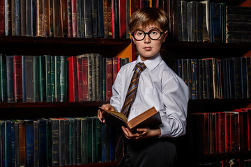 intelligent boy in glasses