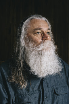 Portrait of senior man with long beard