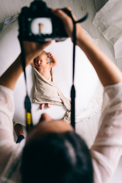 newborn photographer at work