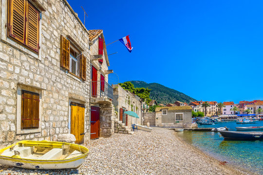 Vis Komiza mediterranean scenery. / Scenic mediterranean view at Komiza on Island Vis, popular summer destination in Croatia, Europe.