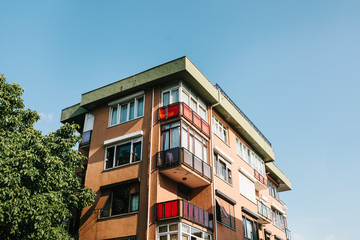 Fototapeta na wymiar Residential building in Istanbul with balconies. Turkey. Ordinary people's life. Authentic.