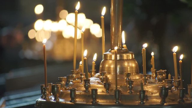 Church candles religion Wax candles burn in the church during the festive prayer
