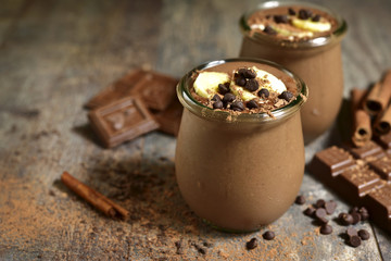 Chocolate banana smoothie with oat and cinnamon. - obrazy, fototapety, plakaty
