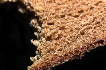Part of bread macro on a black background