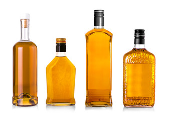 Set of Beautiful Whisky Bottles against well lit background.