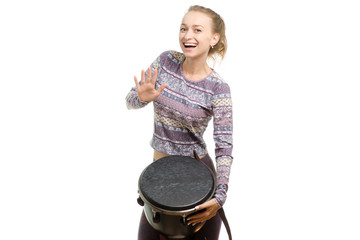 Beautiful girl plays the djembe