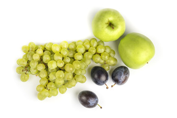 Various, assorted fruits (grape, apple, plum) isolated on the white background with soft shadow