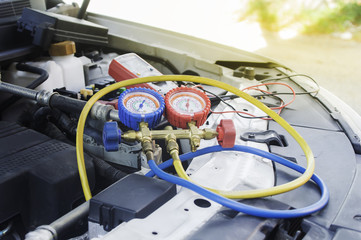 Auto mechanic uses a pressure gauge on the air compressor,liquid air pressure,compressor,manometer...