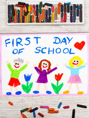 Photo of  colorful drawing: Word FIRST DAY OF SCHOOL and happy children