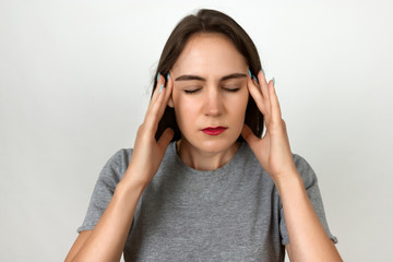 Portrait of a pretty woman  stress and headache having migraine pain