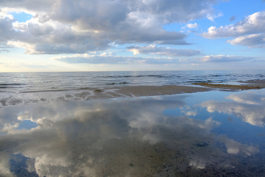Cloud reflection on a beach