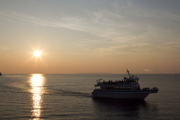 Fototapeta na wymiar Sunset with a ship