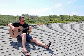 man playing guitar 