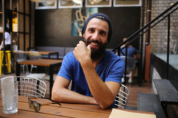 Smiling man with beard