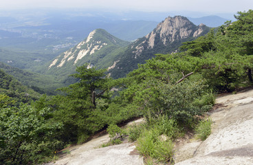 Fototapeta na wymiar Rocky terrain in Bukhansan National Park, a popular place to climb and hike, Seoul Korea