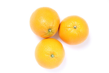orange  on white wooden table