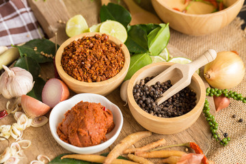 Assortment of Thai food Cooking ingredients. Spices ingredients chilli pepper garlicgalanga and kaffir lime leaves