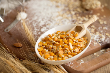Cake making equipment. wooden rolling pin and Various wooden on brown table