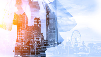 Double exposure of shopping women and city background
