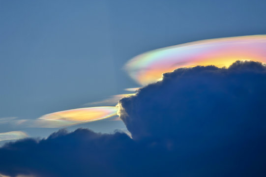fire rainbow cloud phenomenon is a natural phenomenon called irisation or iridescence.
