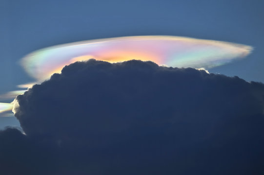 fire rainbow cloud phenomenon is a natural phenomenon called irisation or iridescence.