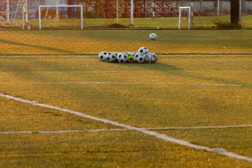 Balls in soccer practice field. Sport concept. Soccer training field.