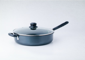 pan or metal frying pan on a background.