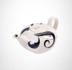 tea pot or ceramic teapot on background.