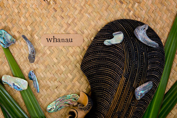 New Zealand - Maori themed objects - mere and abalone shells with Whanua label (maori for family)
