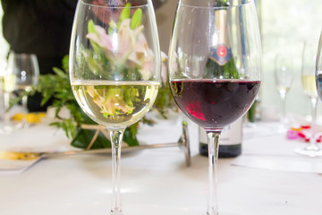 Crystal glasses with red and white wines