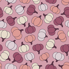 Colorful vector seamless pattern with purple, yellow and orange pumpkins on the pink background. Halloween design.