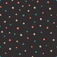 Vector abstract starry seamless pattern on the gray background. Cute red, blue and beige stars.
