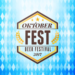 Beer festival Oktoberfest celebrations. Vintage beer badge on the traditional Bavarian flag background wuth light effect