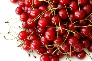 Obraz na płótnie Canvas Ripe cherry fruits on white background