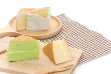 orange and pandan  Chiffon cake on wooden plate