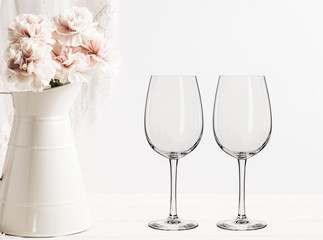 Floral Mockup - 2 empty wine glasses, next to flower arrangement, perfect for businesses who sell decals, vinyl stickers, just overlay your design