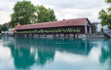 Wooden floodgate-bridge in Thun. Swiss